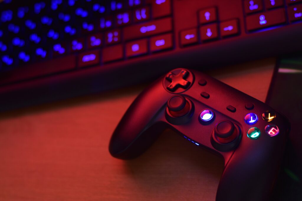 modern-gamepad-lies-with-pc-keyboard-on-table-in-d-2026-03-24-04-04-26-utc